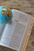 a globe resting at the bible open to the page, Mark
globe, earth, world, mission, missions, evangelism, evangelize, evangelizing, discipleship, disciple, disciples, spreading the gospel, go, going, page, pages, inside, scripture, holy book, table, wooden, wood, Africa, South America, fellowship, study, nation, nations, international, read, reading, peoples, union, cultures, great commission, to all the peoples