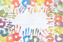 frame of colorful handprints 