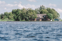 House with a boat by the lake