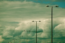 street light under a cloudy sky