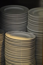 piles of plates – food for many people. 
plate, plates, pile, piles, stack, stacks, batch, reams, batches, flatware, dish, dishes, tableware, dishware, crockery, many, much, lot, white, eat, eating, food, canteen, canteen kitchen, kitchen, cupboard, church kitchen, event, clean, empty, tidied, tidied up, tidy