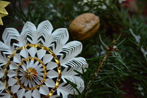 pinwheel ornament in pine garland 