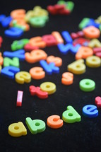 Colorful, magnetic alphabet letters.