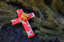 cross wrapped in paper as a present at Christmas day. 