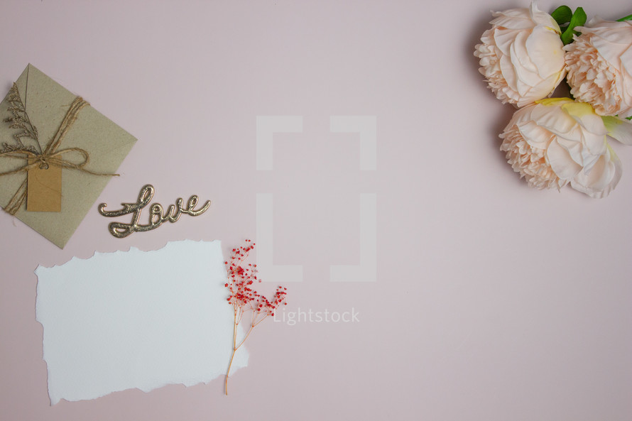 Blank card with envelope and flowers