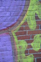 Graffiti on a brick wall. 
