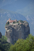 ancient but still inhabited Meteora Monastery built high on rock plateau in Greek