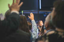 Church with hands raised in worship