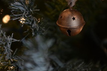 bell ornament on a Christmas tree 