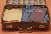 Holy Bible packed in a suitcase 
