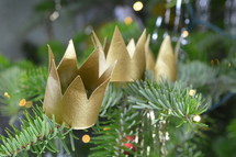 three crowns on a Christmas tree