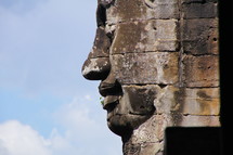 buddhist sculpture in towers of Bayon temple