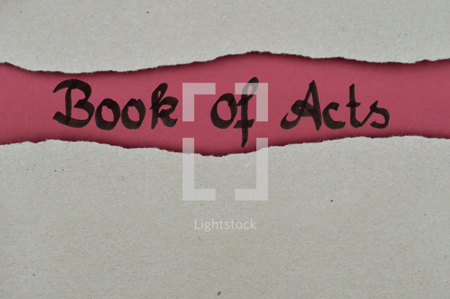 Book of Acts - torn open kraft paper over dark red paper with the name of the book: Acts of the Apostles