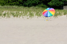 beach umbrella in the sand 