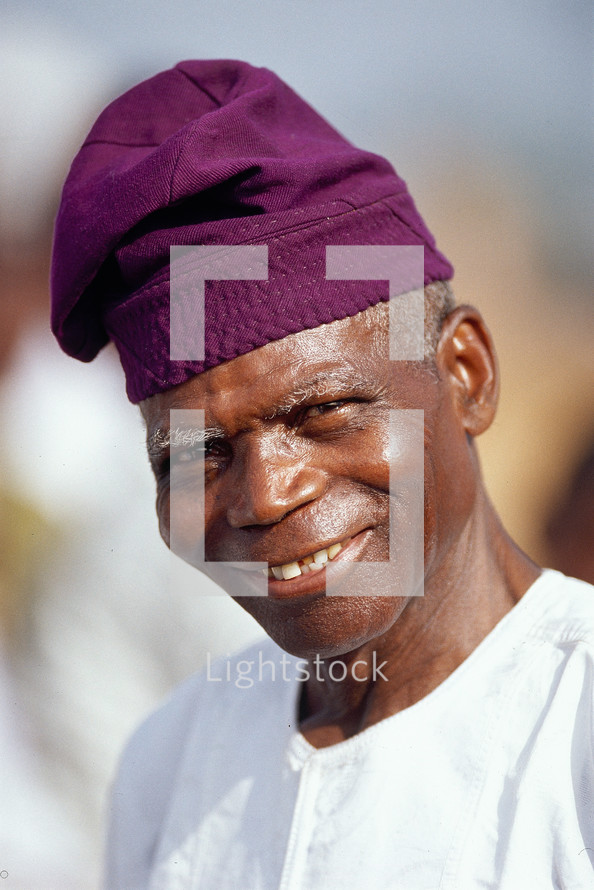 African man in a cloth hat