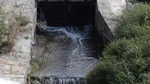 water flowing from a dam