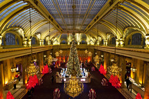 large Christmas tree in a grand hotel lobby