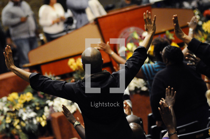 hands raised in worship to God at Church 