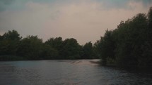 Calm river water video from a boat on the Norfolk Broads, sailing, water