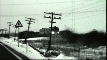 Diesel train in the countryside filmed in B/W.