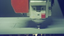 Laser cutting machine cutting a large metal sheet