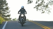 man riding a motorcycle 