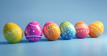 Easter eggs on blue background background. Happy Easter. Colorful painted easter eggs