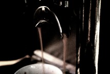 cappuccino maker pouring