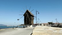 an old windmill at the coast 