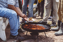 men cooking outdoors in Mexico 