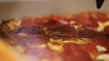 cutting a pizza 
