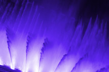 purple fountains of water dancing to music
