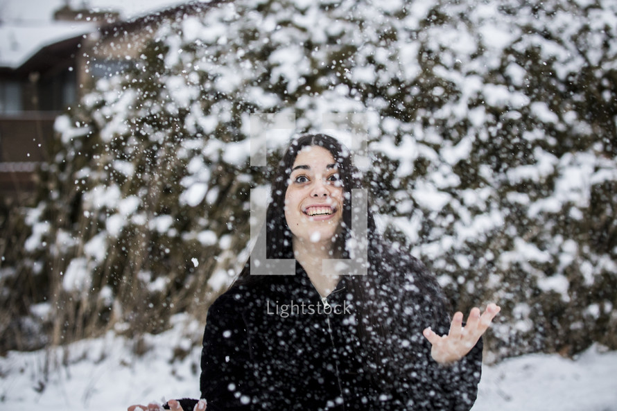 a woman in falling snow 