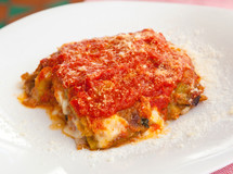 Parmigiana. iItalian food with eggplant, tomato and cheese.