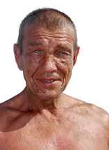 Portrait of a tanned elderly man. 