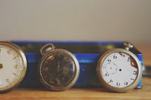 row of vintage stop watches 