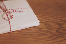 Hope tag on small gift