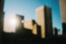 blurry image of distant skyscrapers 