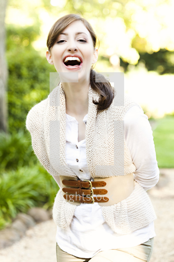 A laughing young woman.