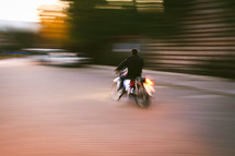 man riding a motorcycle 
