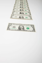 Series of one dollar bills.