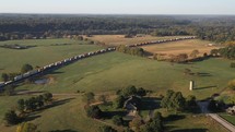 Aerial shot of train through countryside