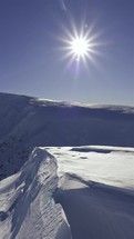Vertical video of winter alps mountains in beautiful sunny day in frozen snowy nature
