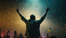 Celebration. Silhouette of a man in worship with confetti