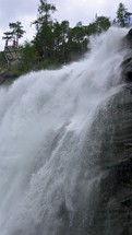 Vertical video of Stuibenfall waterfall in Tirol alps nature
