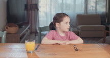 Child nutrition - girl refusing to eat healthy food