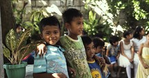 Boys laughing and playing in the Philippines