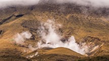 Volcanic smoke clouds from crater of volcano mountains in New Zealand Tongariro National Park Time-lapse
