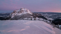 Beautiful sunrise in winter snowy mountains, time lapse, dolly shot
