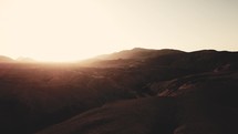 sunset over desert mountains 